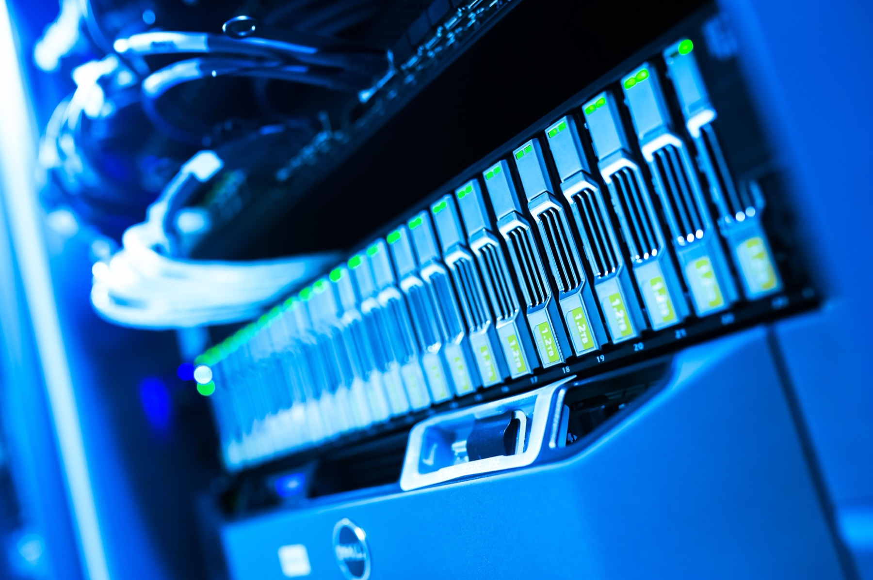 Blue-lit computer servers in a data centre